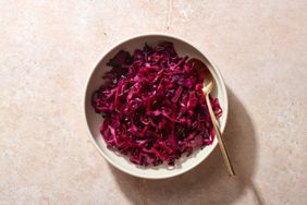 sauteed red cabbage in bowl with spoon