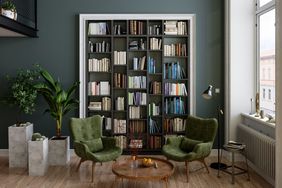 Green painted study with color-blocking around the bookcase