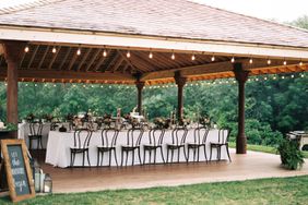 air bnb wedding venue tables set in outdoor gazebo