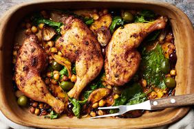 baked chicken legs with chickpeas olives and greens
