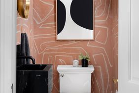 salmon and white geometric print bathroom walls
