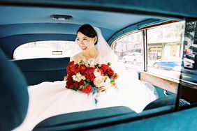 bold lipstick bride in back seat of vintage car