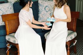 brides exchanging Tiffany Co. wedding gifts