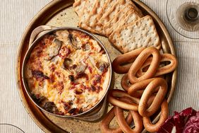cheese dip with pretzels and crackers