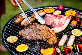 Grilling steak with meat and citrus