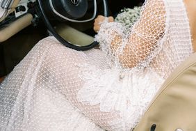 bride wearing long sleeve netted lace mermaid wedding dress
