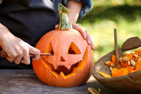 carving pumpkins for halloween and saving the pumpkin seeds