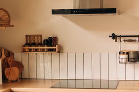 glass stovetop in neutral modern kitchen