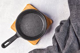 Cast iron skillet on cutting board