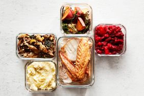 Thanksgiving Leftovers in Containers on White Wood
