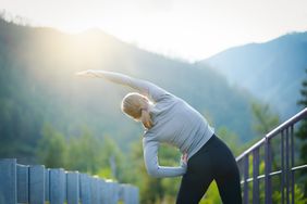 woman exercising balance outdoors
