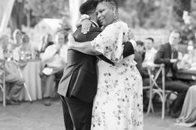 mother and groom hugging during wedding dance