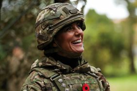  Princess of Wales reacts as she visits The Queen's Dragoon Guards Regiment for the first time 