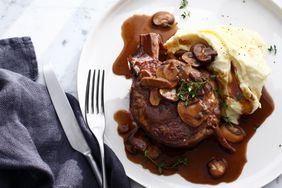 brown gravy with steak and mashed potatoes
