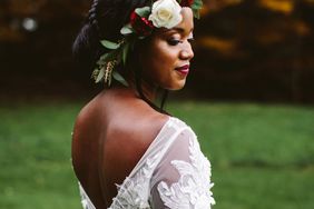 rivka aaron wedding bride low back dress flowers in hair