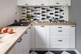 Small Kitchen with black and white details