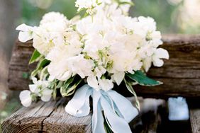 sweet pea bouquet with blue ribbon