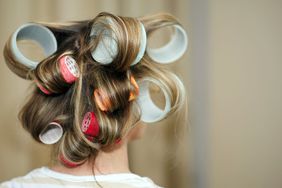 woman with velcro rollers in hair