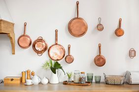copper pans on the wall