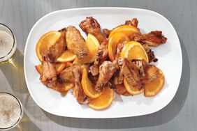 oven baked wings with orange slices