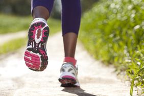 close up of woman jogging outdoors
